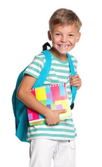 Little boy with exercise books