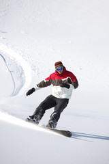 Fototapeta na wymiar Snowboarder w akcji