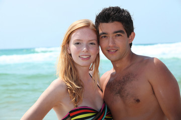 Fototapeta premium Young couple on the beach