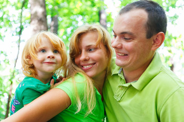 Fototapeta premium Portrait of a funny family having fun