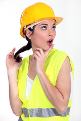 Woman with yellow helmet