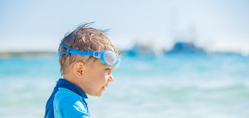 Cute boy on the beach