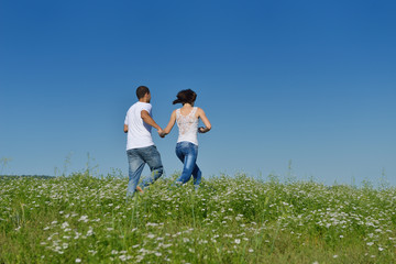 happy couple in wheat field