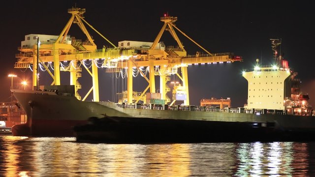 crane bridge at dusk for Logistic Import Export