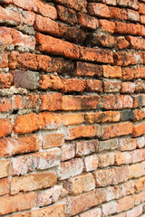 Ancient Buddhist temple wall in Ayutthaya, Thailand.