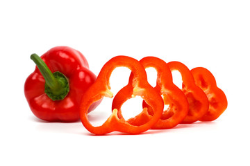 Cut red pepper isolated on white background.