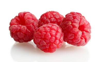 ripe raspberries isolated on white