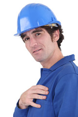 handsome blue collar wearing jumpsuit