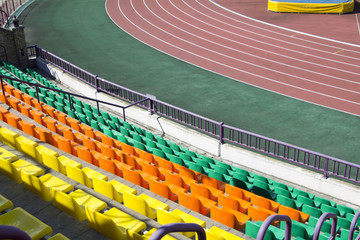 Obraz premium rows of plastic seats at stadium