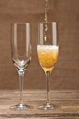 Champagne pouring in glass
