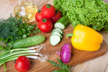 Fresh vegetables on cutting board.