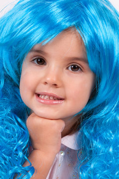 Pretty little girl with long blue hair