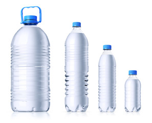 Group of  plastic bottles with water. Isolated on white.