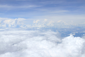 Airplane above clouds