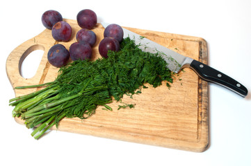 Dill on kitchen board cutting