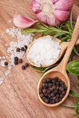 Fresh herbs and salt spoon