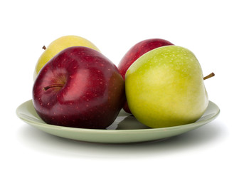 Apples pile on plate