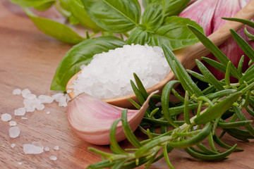 Fresh herbs and salt spoon