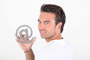 Man holding at symbol