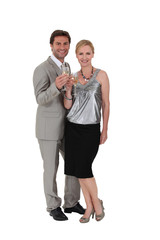 Studio shot of a couple drinking champagne