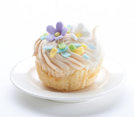 Fancy tart or cupcake topping with icing flower