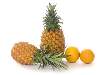 Isolated pineapple and orange