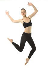 Fototapeta na wymiar girl in black sportwear jumping