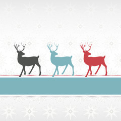 Drei Rentiere auf silbernem Hintergrund