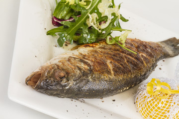 Sea-bass with vegetables