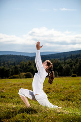 Woman exercising yoga outdoor