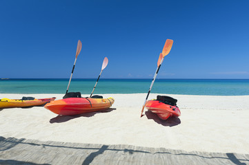 Canoes on beach by the Mediterranean Sea