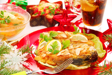 deep-fried carp with almonds  on christmas table