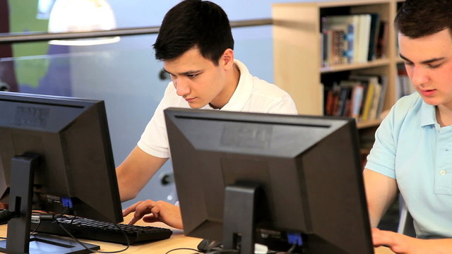 Male students learning online in hub