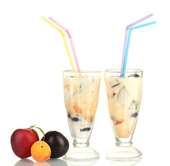Milk shakes with fruit isolated on white close-up