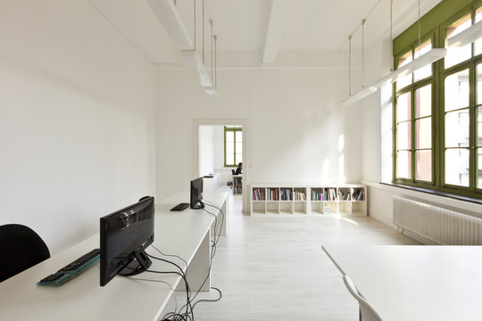interior old building, office with modern white furniture