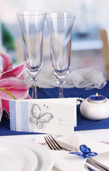Serving fabulous wedding table in purple and blue color of the