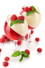 fruit jelly with raspberries in glasses isolated on white