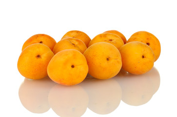 Ripe apricots isolated on white close-up