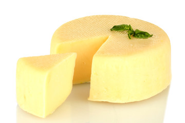 sliced mozzarella cheese with green basil isolated on white