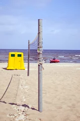 Foto op Canvas Volleyball net sea sand waste bin lifeguard boat © sauletas