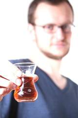 guy holding a cup of tea