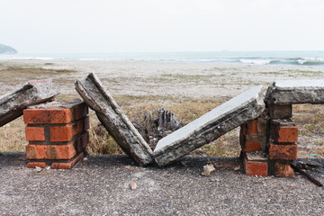 Broken Stone benches on the beach