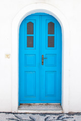 Fototapeta na wymiar Traditional greek blue doors