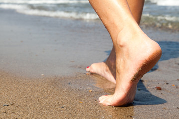 Woman walking on beach