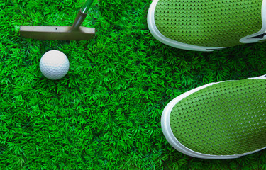 golf ball and green grass field