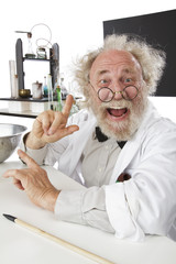 Eccentic scientist in lab excited about ideas