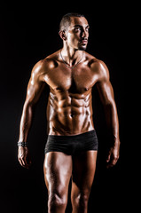 Fototapeta na wymiar Bodybuilder with muscular body
