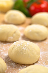 Small balls of fresh homemade pizza dough