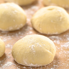 Small balls of fresh homemade pizza dough