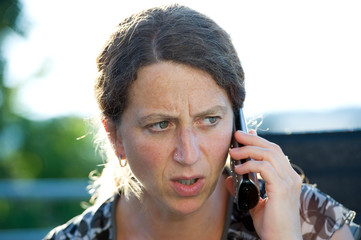 woman has a earnestly telephone call